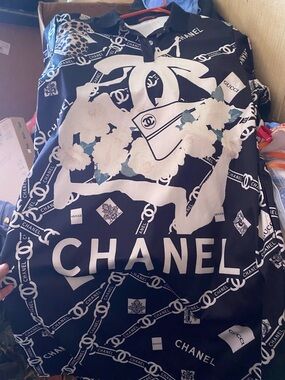 CHANEL Black & White Logo-Print Polo Shirt with Floral Accents
